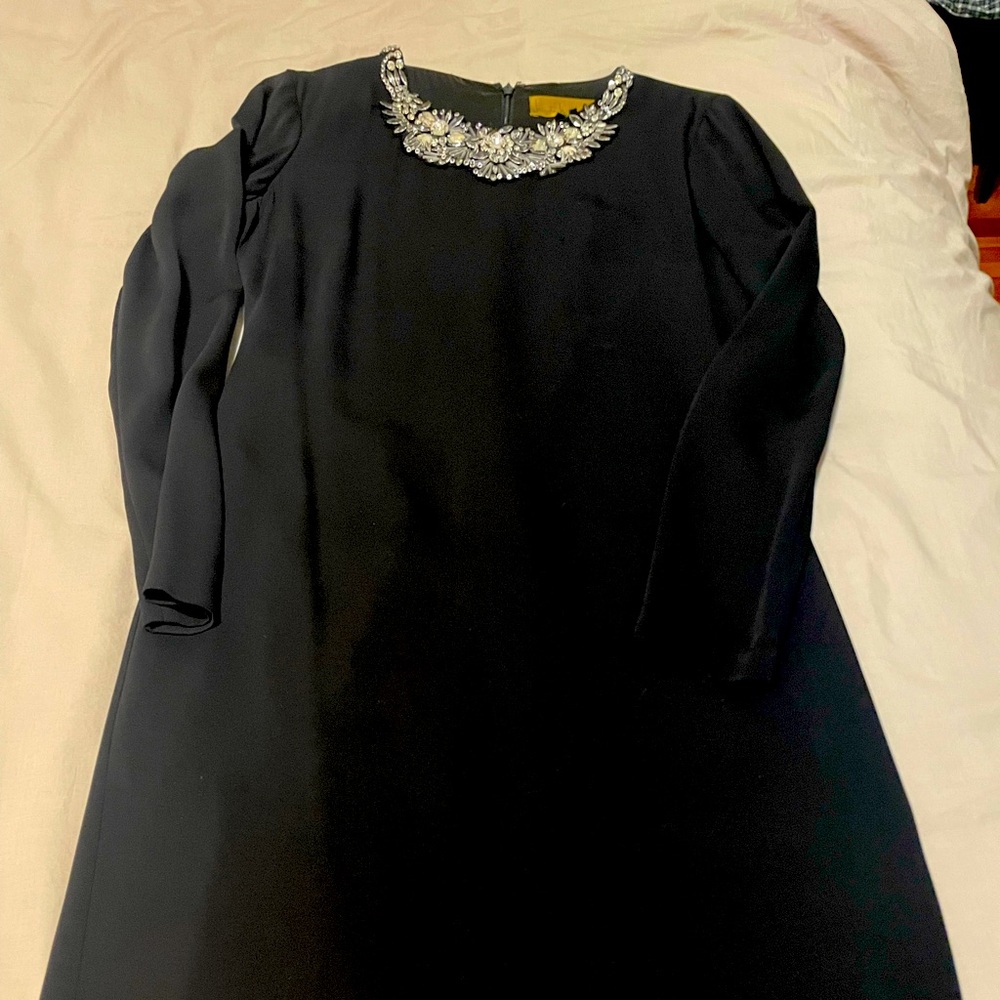 Elegant Black Dress with Embellished Neckline